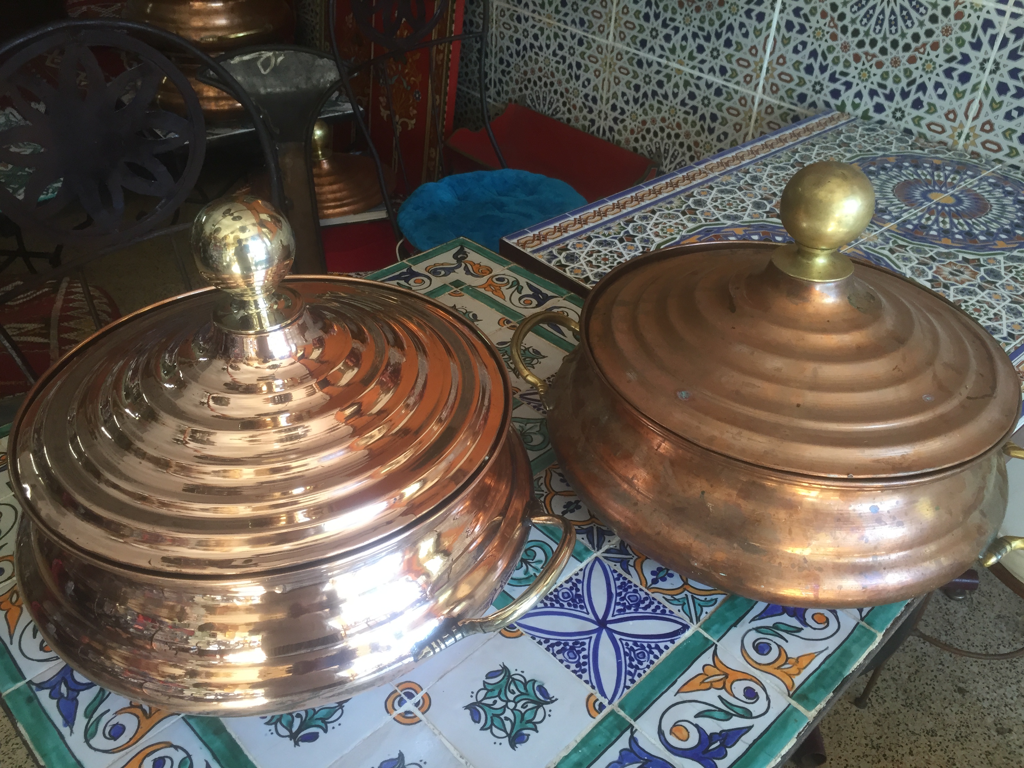 Copper pots polished to a bright shine